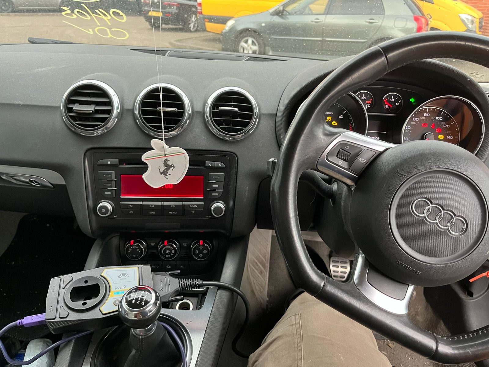 Key programming equipment connected inside the Audi TT during the key-learn procedure