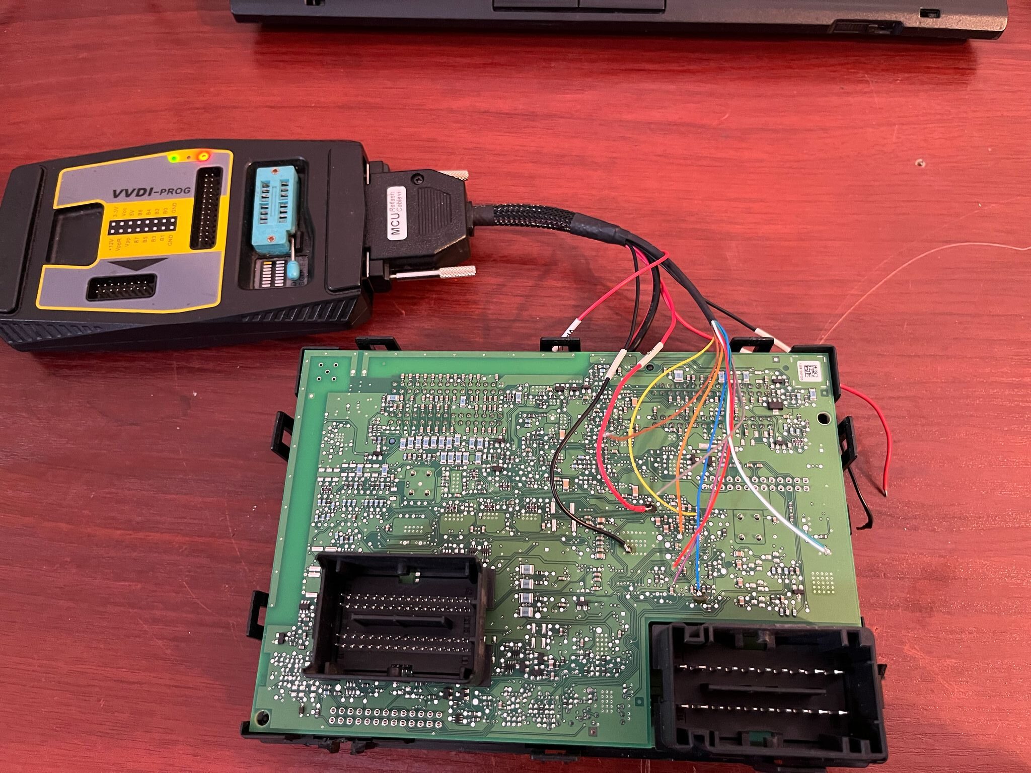 Automotive electronic module programming using VVDI-PROG equipment