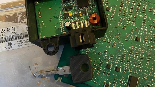 ECU and immobiliser module opened for electronic repair and key programming