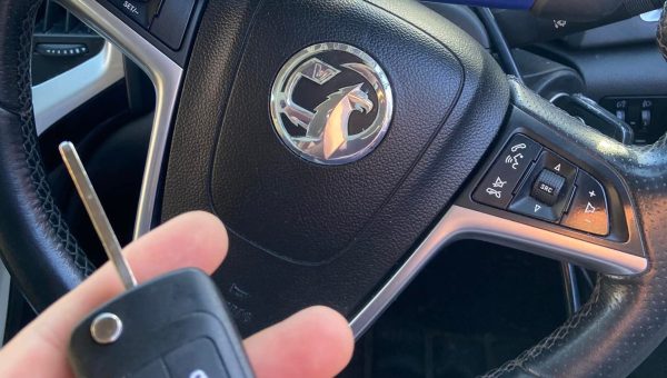 Vauxhall key programming in progress using diagnostic tool inside vehicle in Evesham